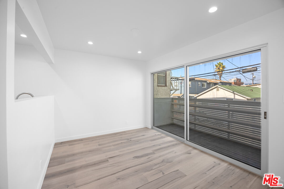 21 1/2 Wavecrest Avenue Venice, CA 90291 - Photo 12 of 29 a view of a room with racks on the wall