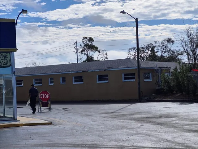 a view of a street with cars on road