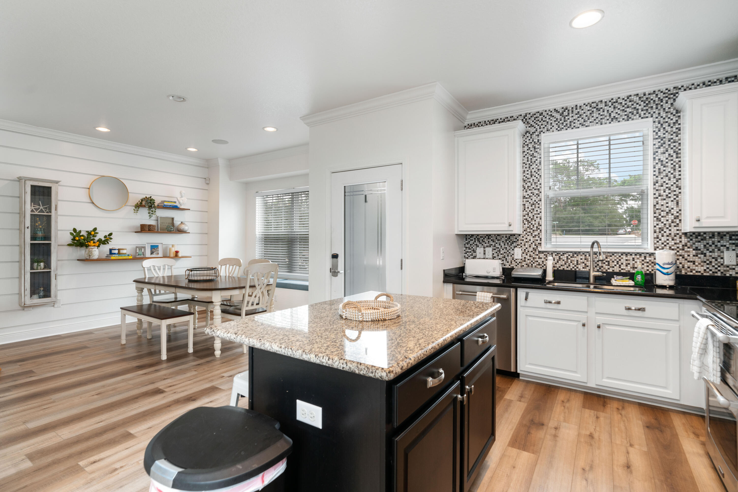 104 Sandpine Loop Inlet Beach, FL 32461 - Photo 11 of 26 a kitchen with granite countertop a sink stove and cabinets