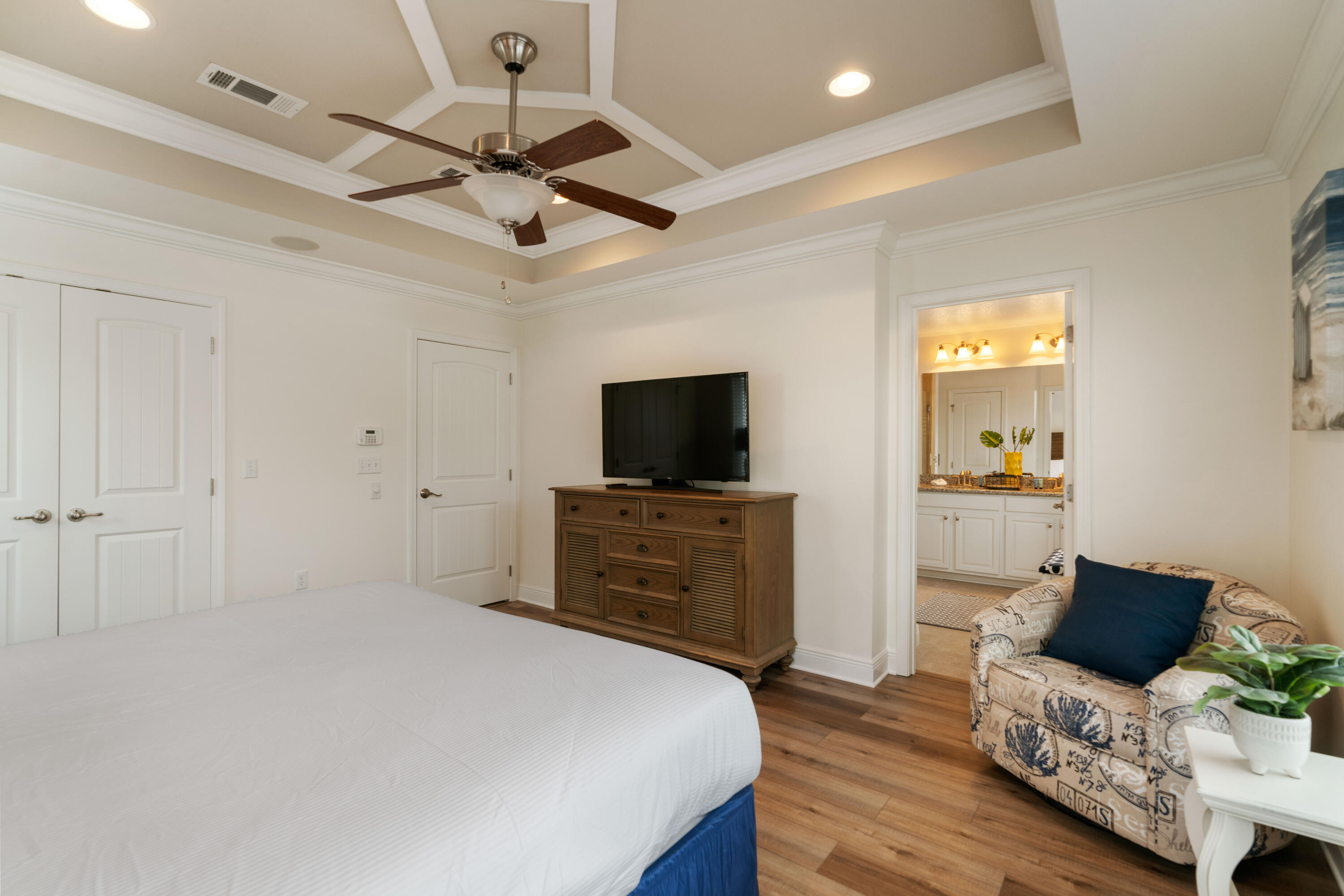 104 Sandpine Loop Inlet Beach, FL 32461 - Photo 14 of 26 a bedroom with a bed and a flat screen tv