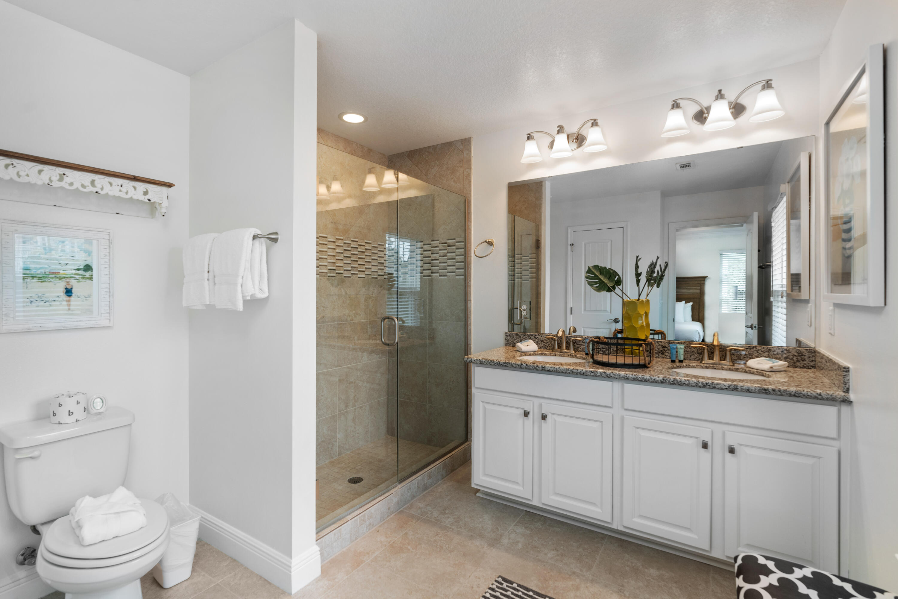 104 Sandpine Loop Inlet Beach, FL 32461 - Photo 16 of 26 a bathroom with a granite countertop sink a toilet and a mirror