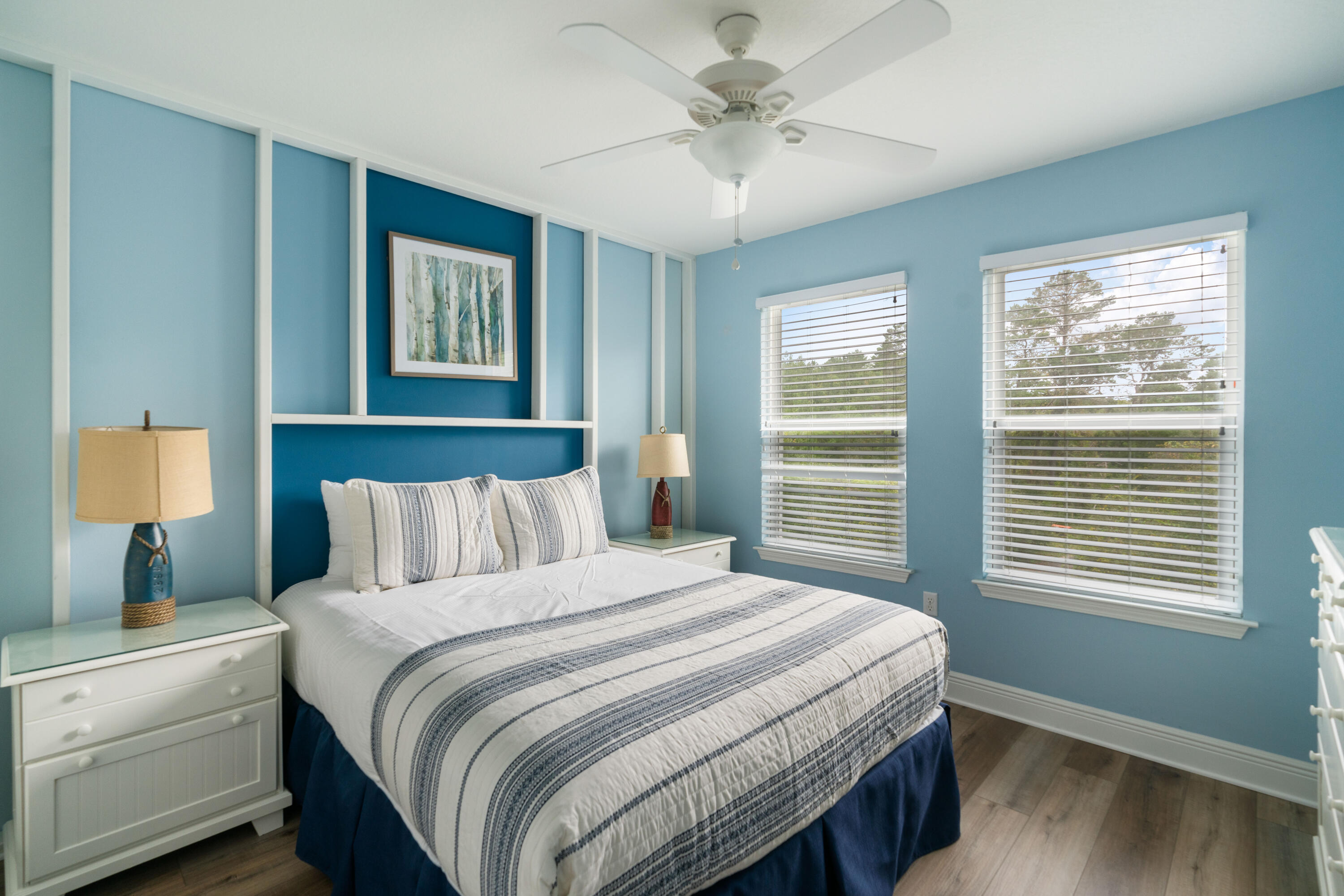 104 Sandpine Loop Inlet Beach, FL 32461 - Photo 17 of 26 a bedroom with a bed and a window