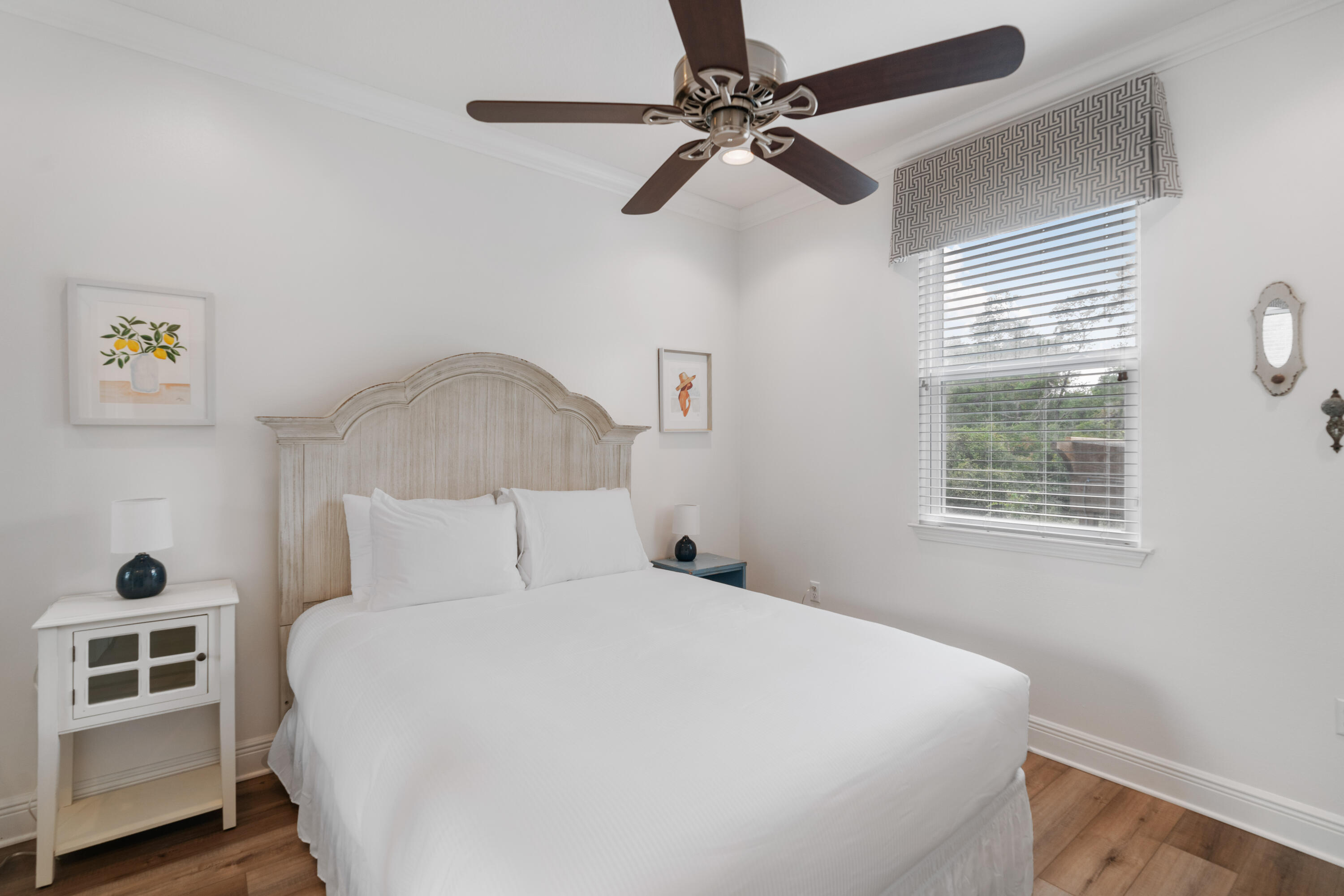 104 Sandpine Loop Inlet Beach, FL 32461 - Photo 20 of 26 a bedroom with a large bed and a window