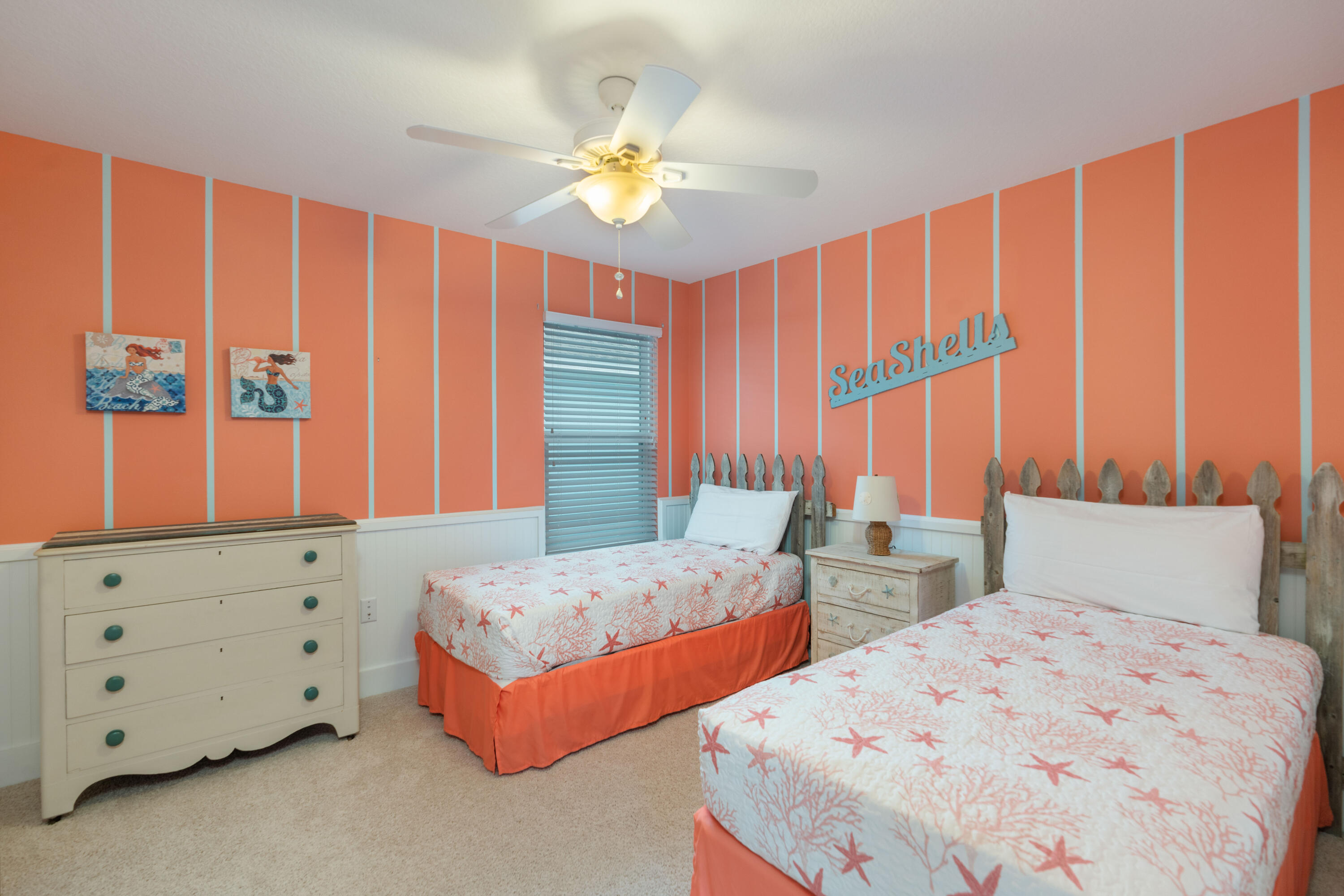 104 Sandpine Loop Inlet Beach, FL 32461 - Photo 22 of 26 a bedroom with two beds and large windows