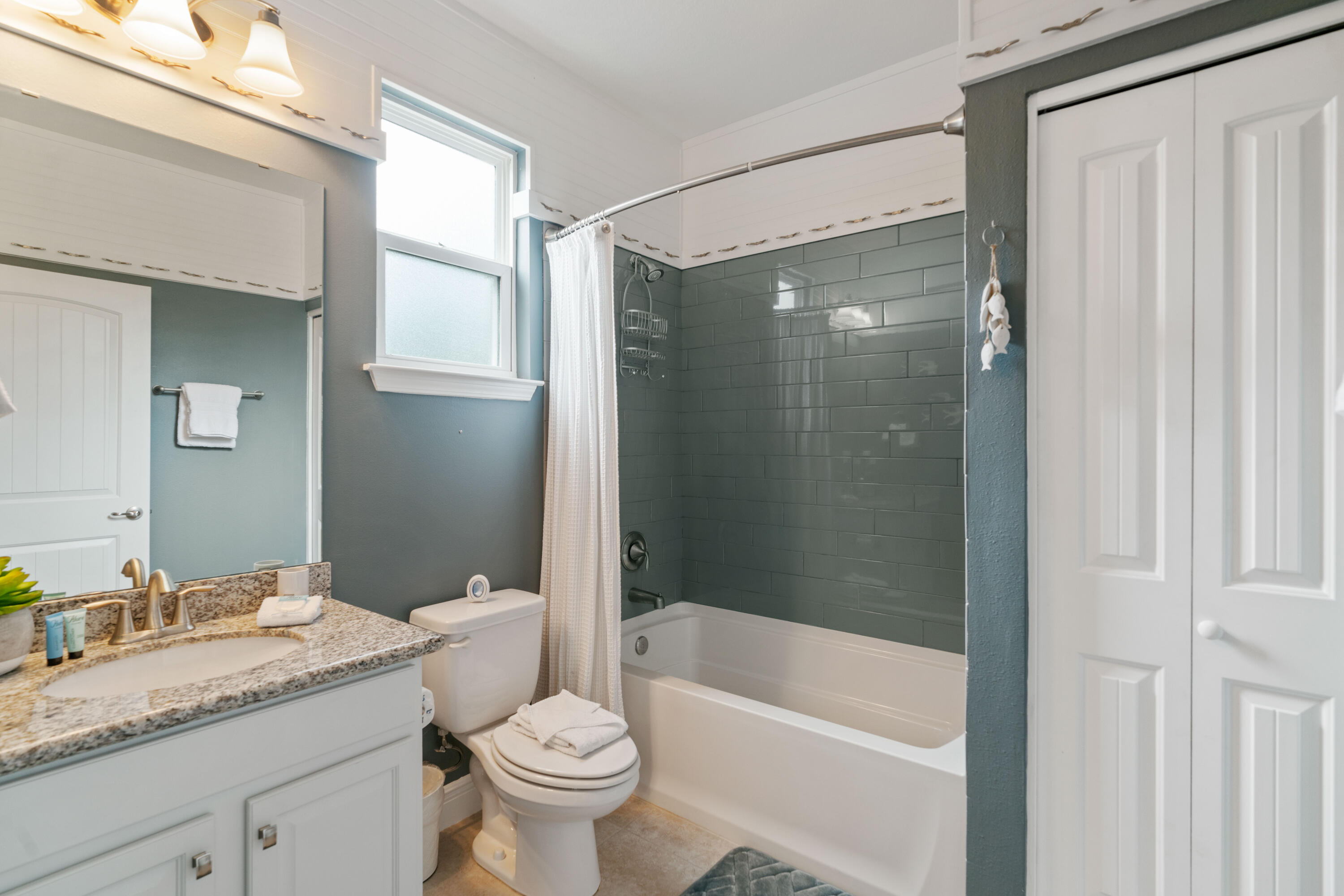 104 Sandpine Loop Inlet Beach, FL 32461 - Photo 23 of 26 a bathroom with a granite countertop sink toilet and shower