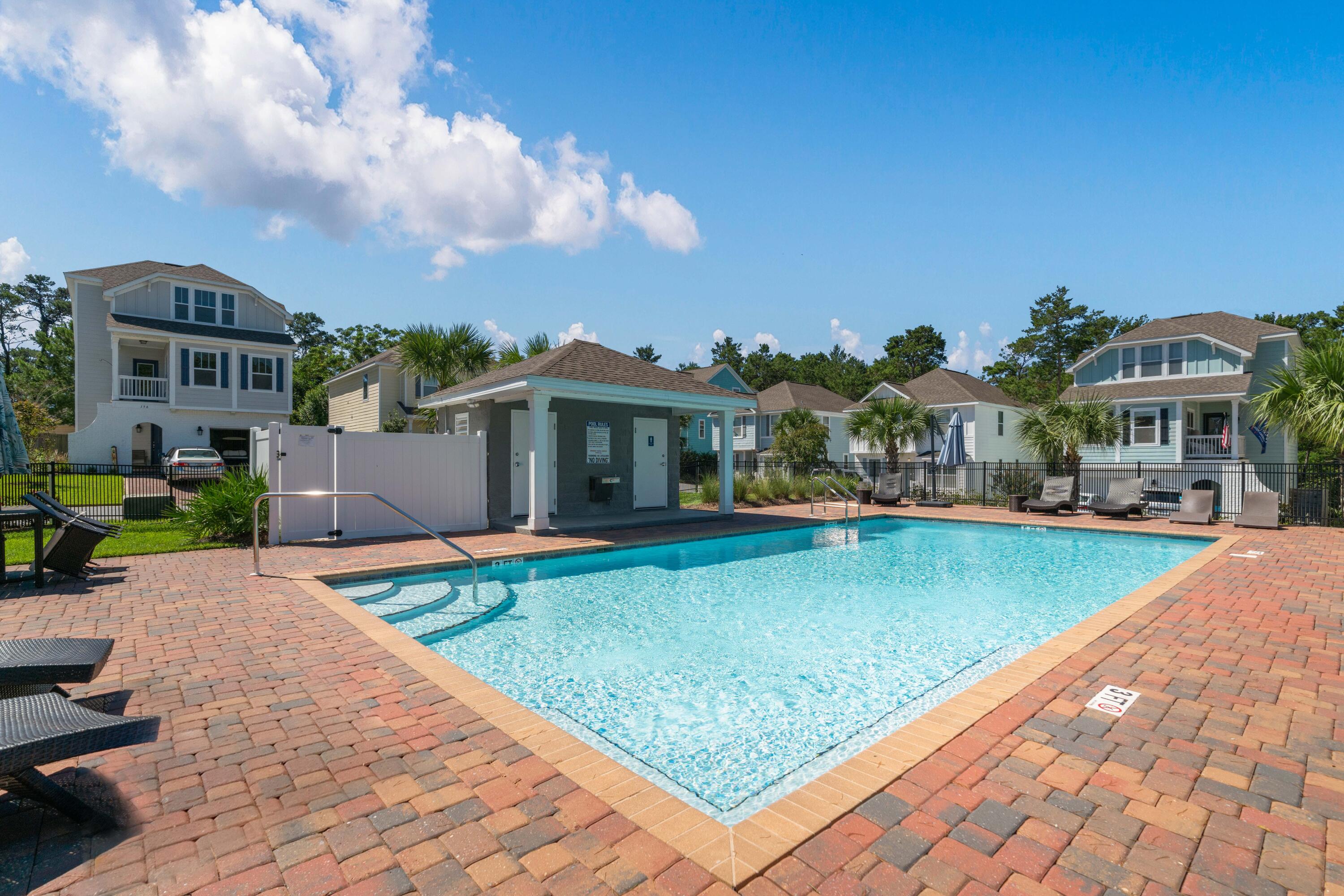 104 Sandpine Loop Inlet Beach, FL 32461 - Photo 26 of 26 a front view of a house with garden
