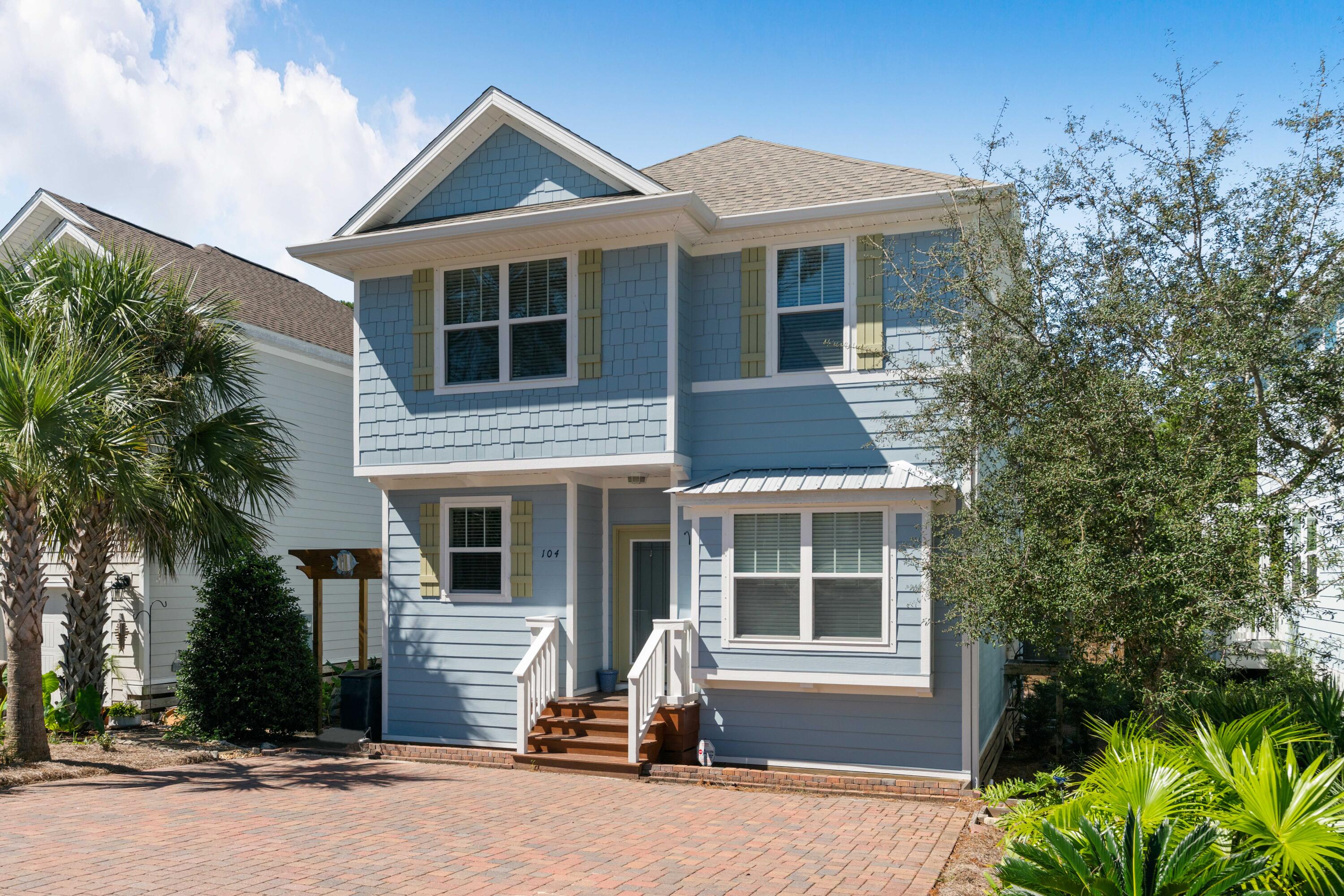 104 Sandpine Loop Inlet Beach, FL 32461 - Photo 3 of 26 front view of house with a yard