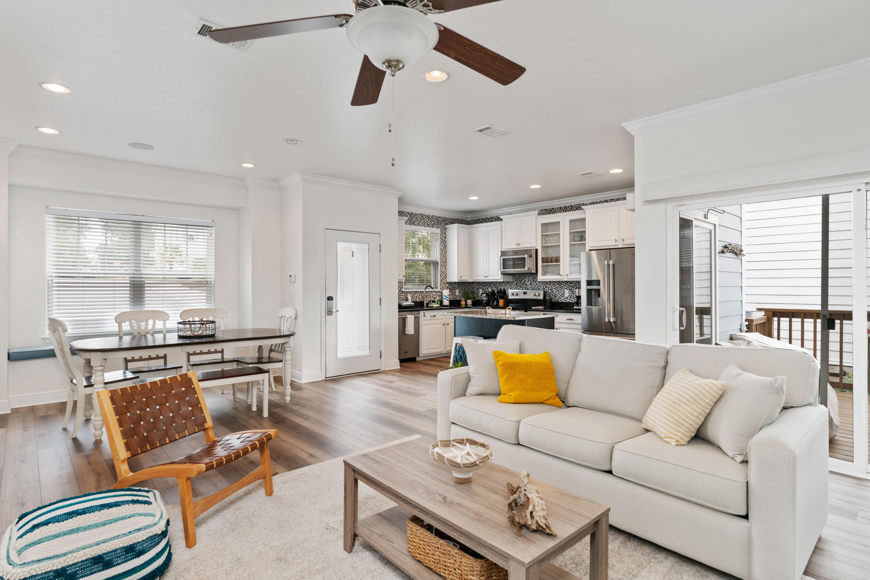 104 Sandpine Loop Inlet Beach, FL 32461 - Photo 4 of 26 a living room with furniture kitchen view and a large window
