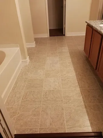 a view of hallway with shower