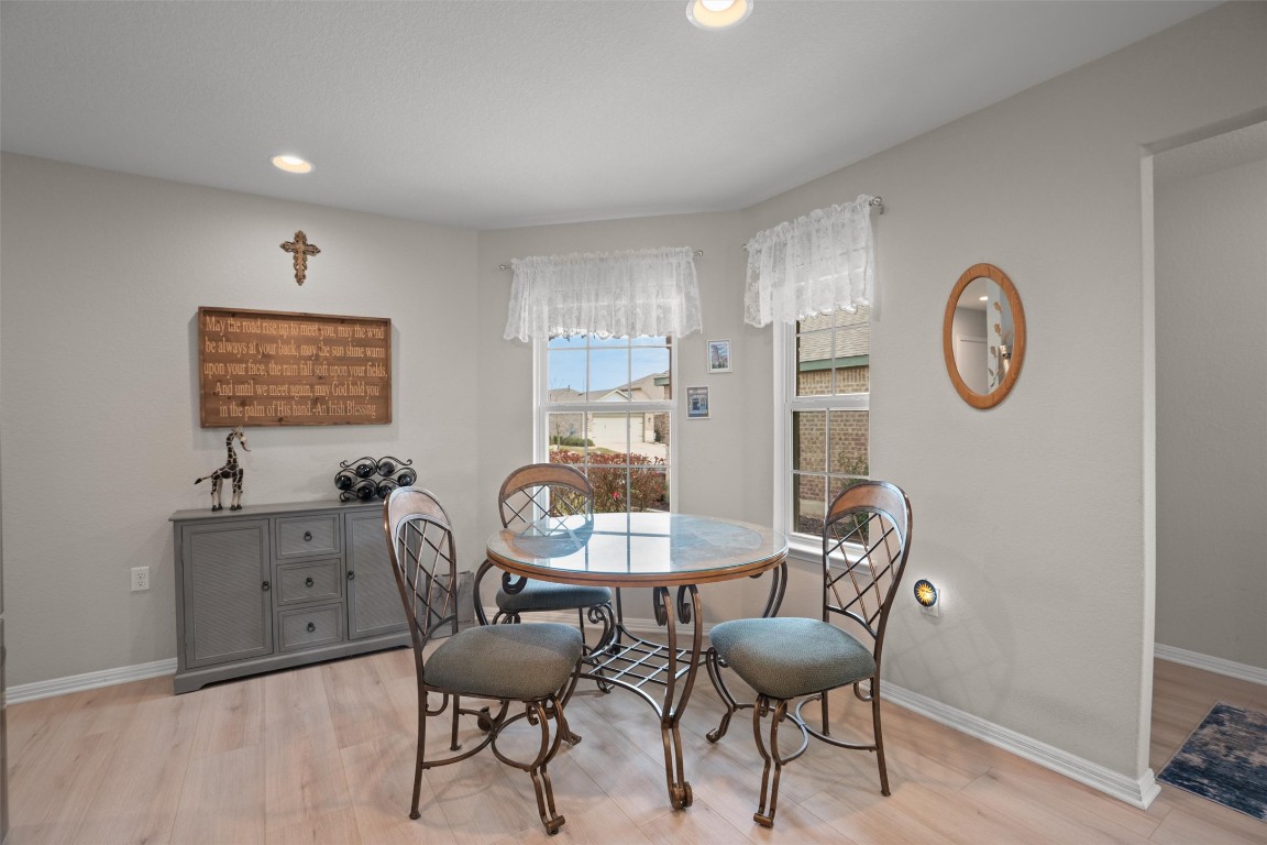 512 Rockport Street Georgetown, TX 78633 - Photo 4 of 26 a view of a room with a table and chairs