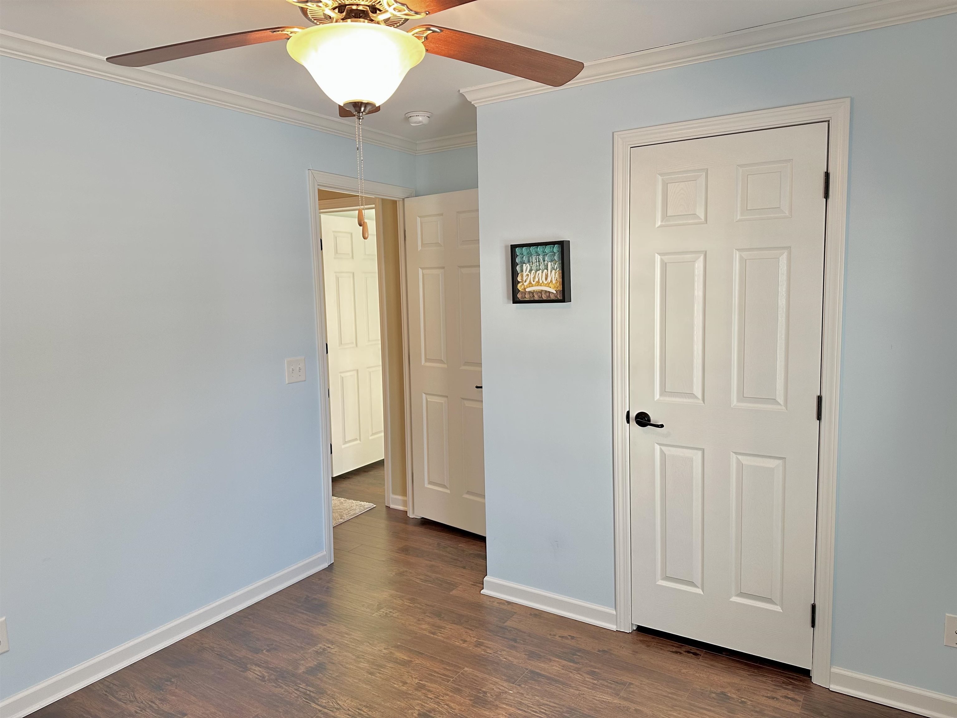 2058 Shore Road Seaville, NJ 08230 - Photo 30 of 36 an empty room with wooden floor and windows