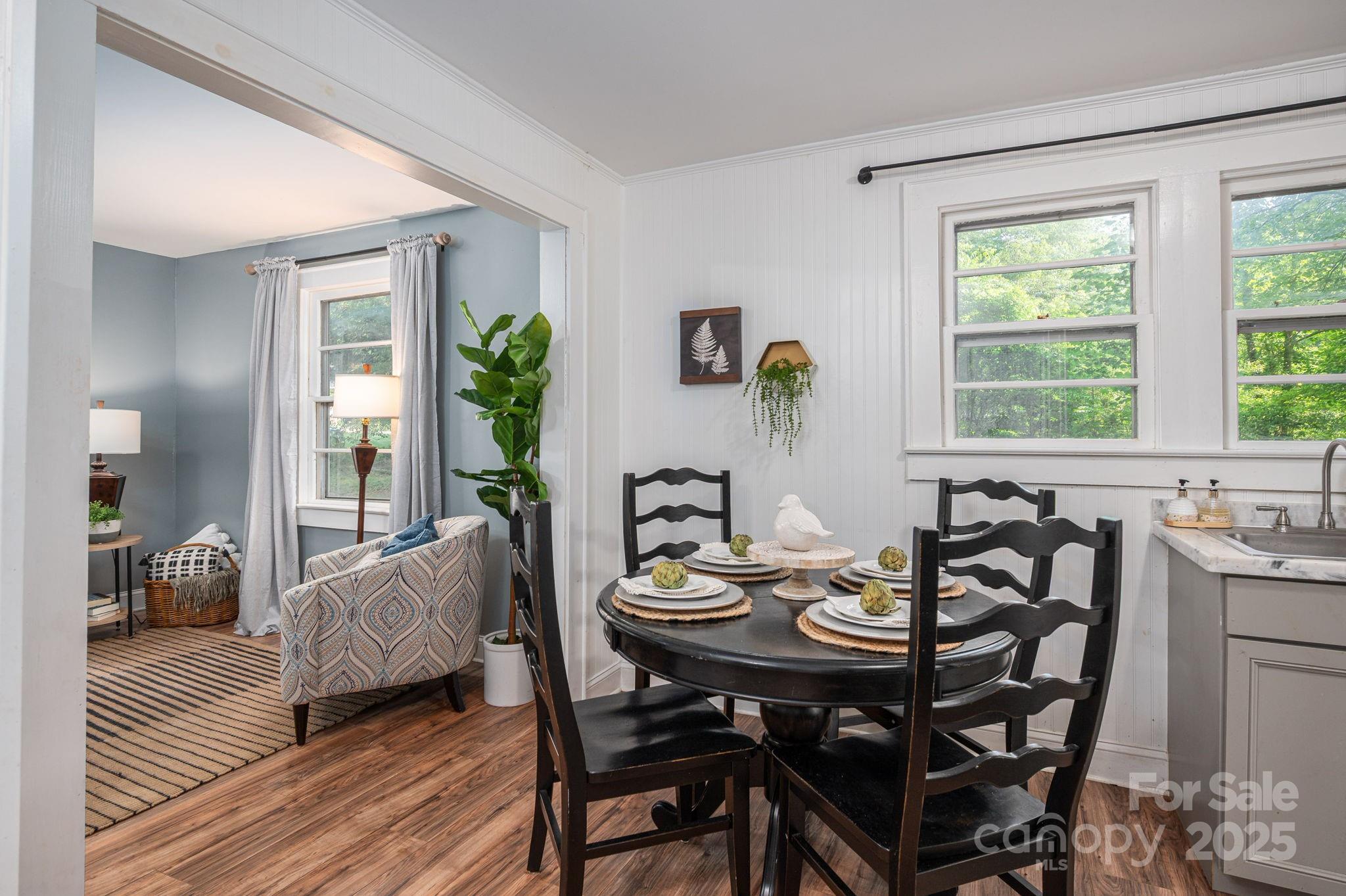 143 Hallman Street Cherryville, NC 28021 - Photo 12 of 31 a view of a dining room with furniture and wooden floor