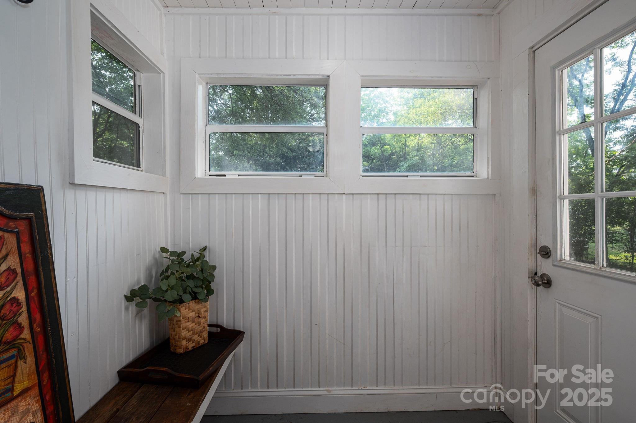 143 Hallman Street Cherryville, NC 28021 - Photo 18 of 31 a room with wooden floor and a potted plant