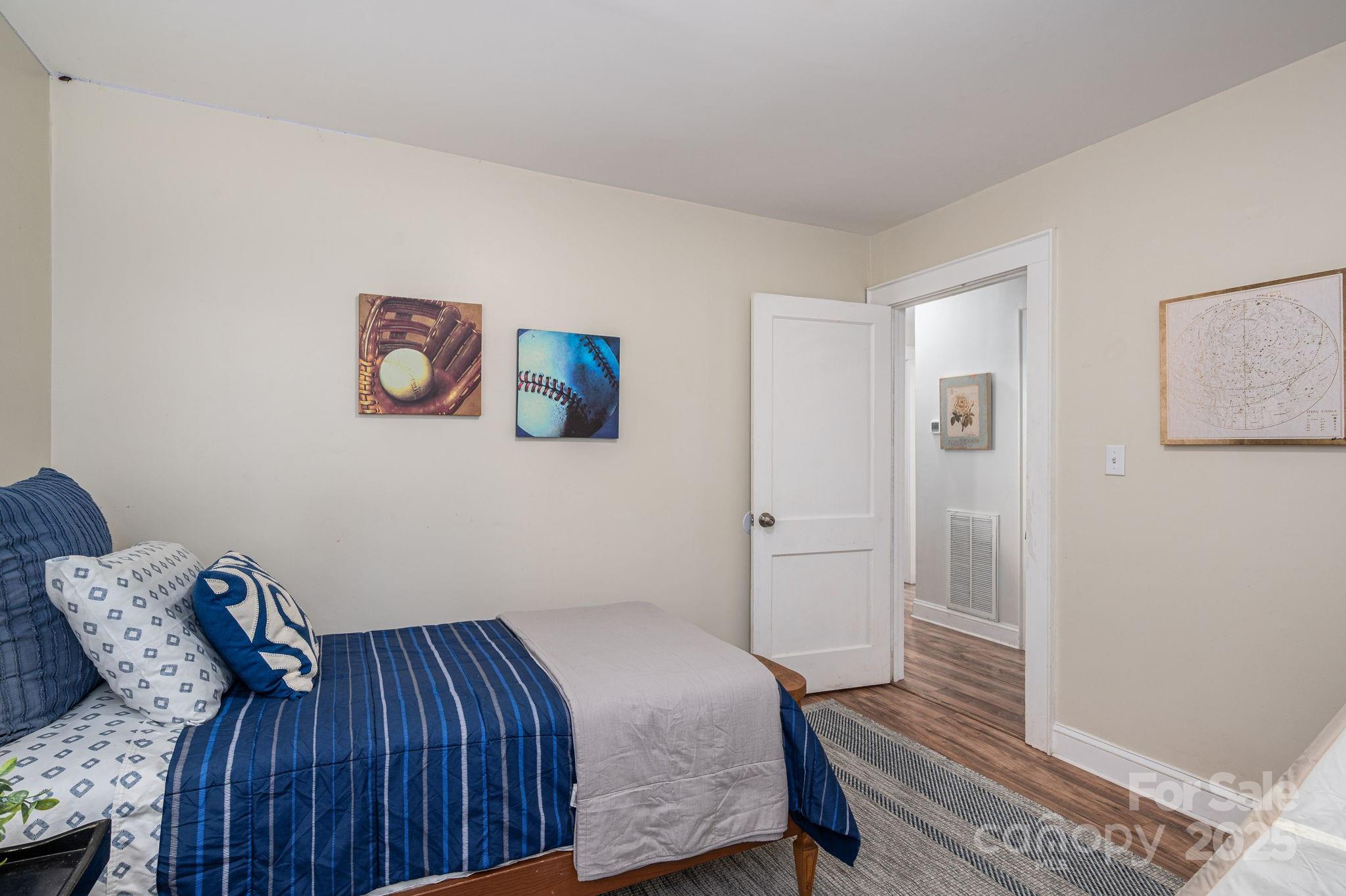 143 Hallman Street Cherryville, NC 28021 - Photo 22 of 31 a bedroom with a bed and furniture