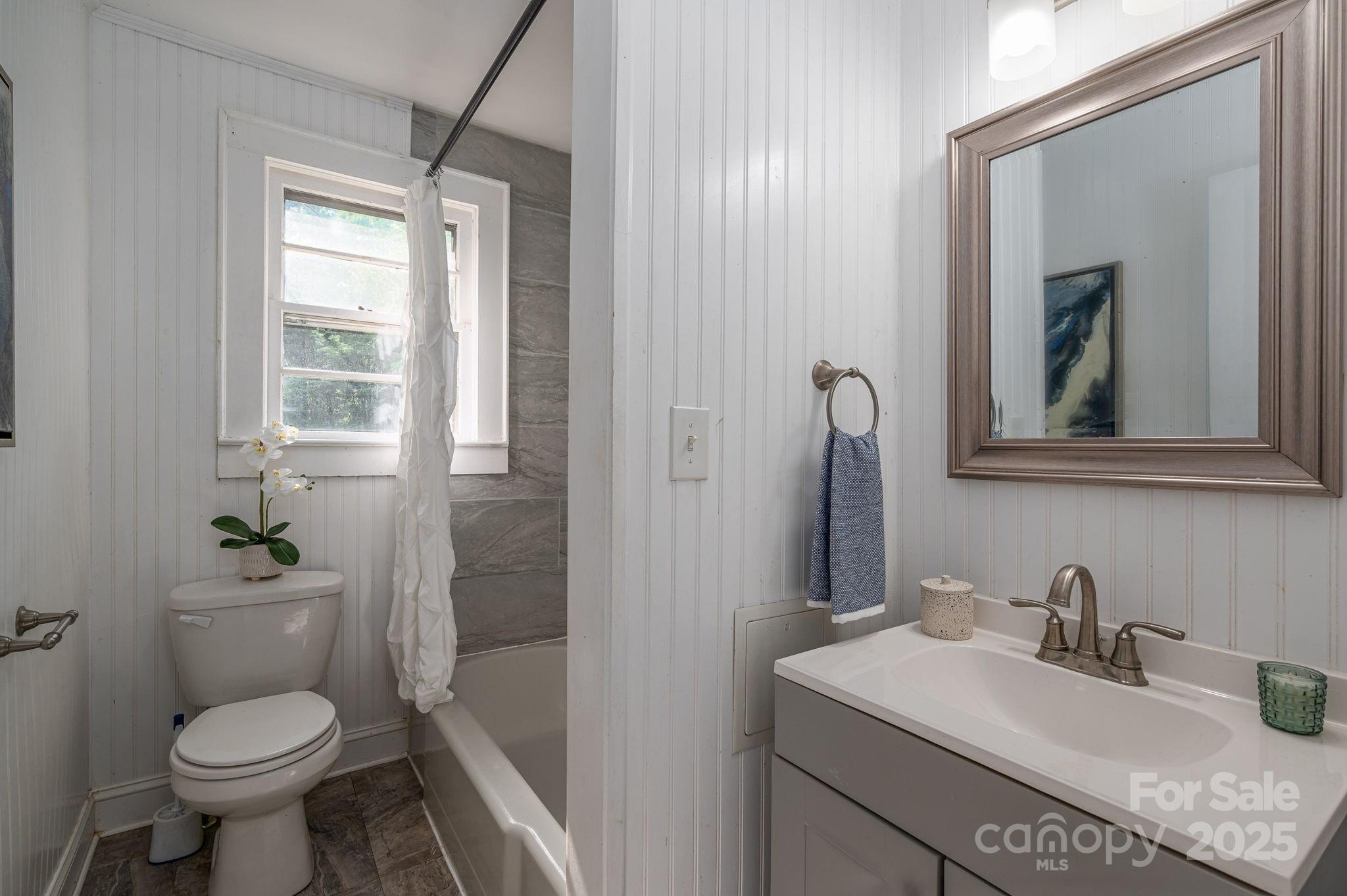 143 Hallman Street Cherryville, NC 28021 - Photo 23 of 31 a bathroom with a granite countertop sink toilet and mirror