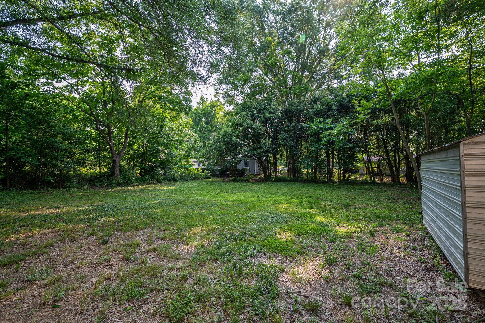 143 Hallman Street Cherryville, NC 28021 - Photo 29 of 31 a view of outdoor space with deck and yard