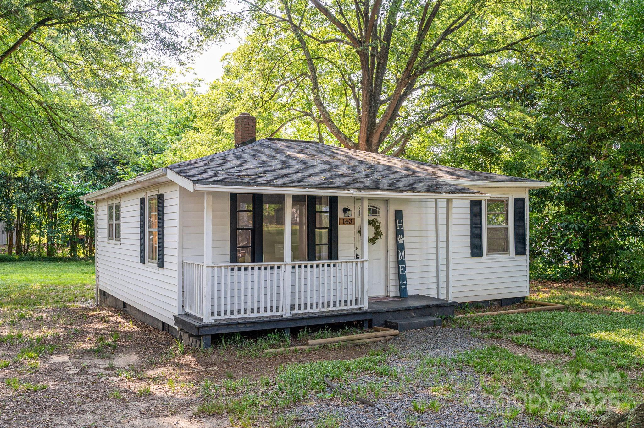 143 Hallman Street Cherryville, NC 28021 - Photo 4 of 31 a view of a house with a yard and deck