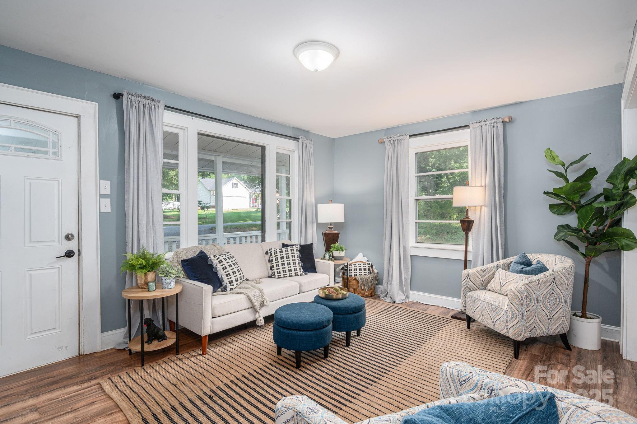 143 Hallman Street Cherryville, NC 28021 - Photo 9 of 31 a living room with furniture and a large window