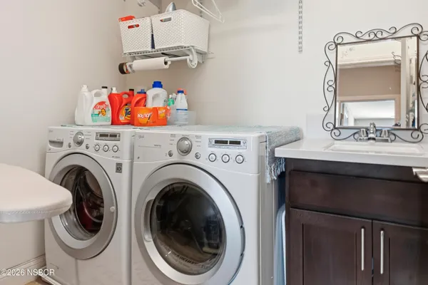 a utility room with dryer and washer