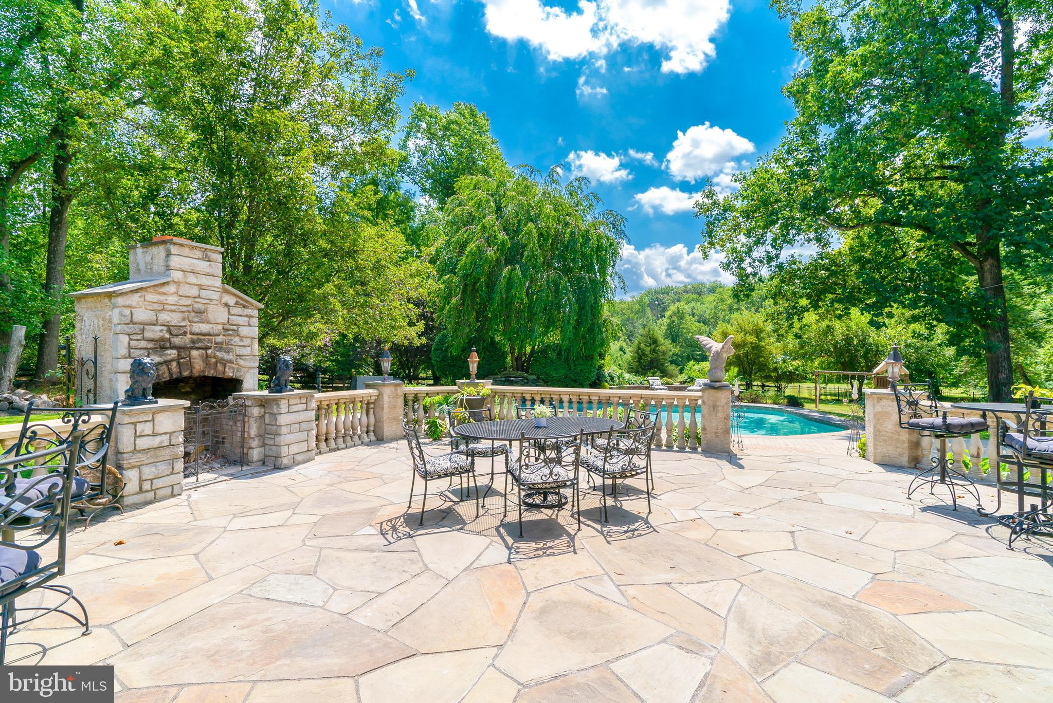 1520 Penllyn Blue Bell Pike Blue Bell, PA 19422 - Photo 44 of 56 Patio and Fireplace