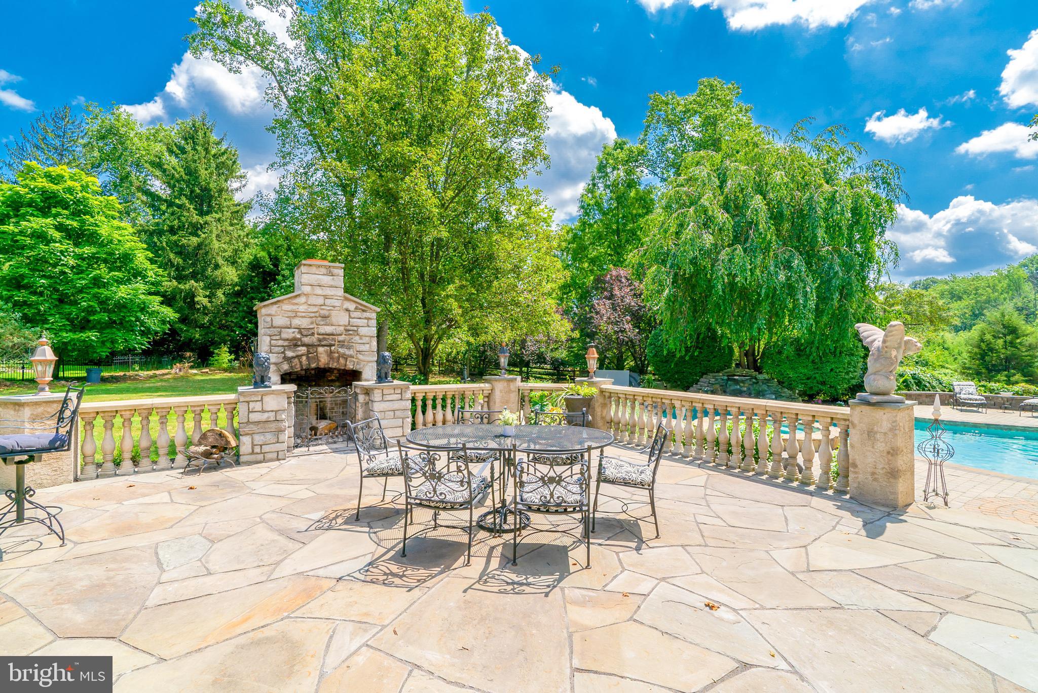 1520 Penllyn Blue Bell Pike Blue Bell, PA 19422 - Photo 45 of 56 Patio and Fireplace