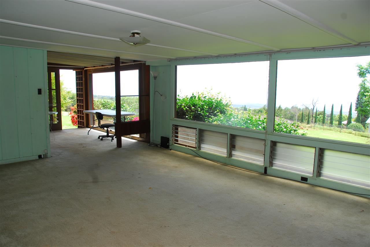 745 Lower Kimo Drive, Unit A Kula, HI 96790 - Photo 11 of 16 a view of a room with gym equipment and windows
