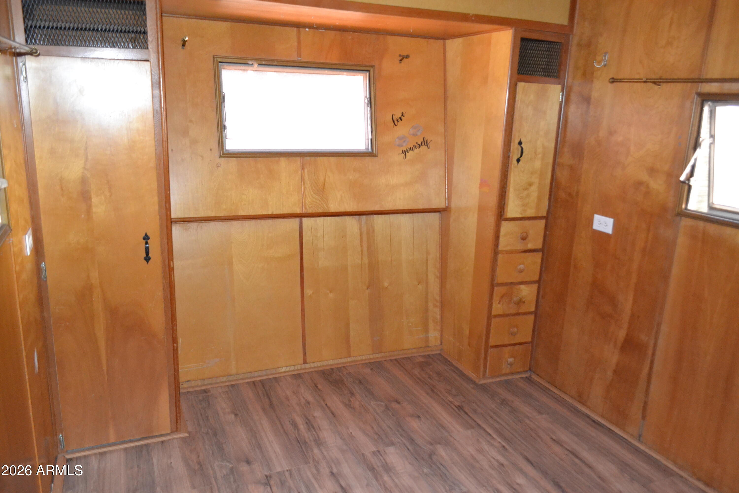 5994 D Street Lakeside, AZ 85929 - Photo 11 of 21 a view of a hallway with wooden floor