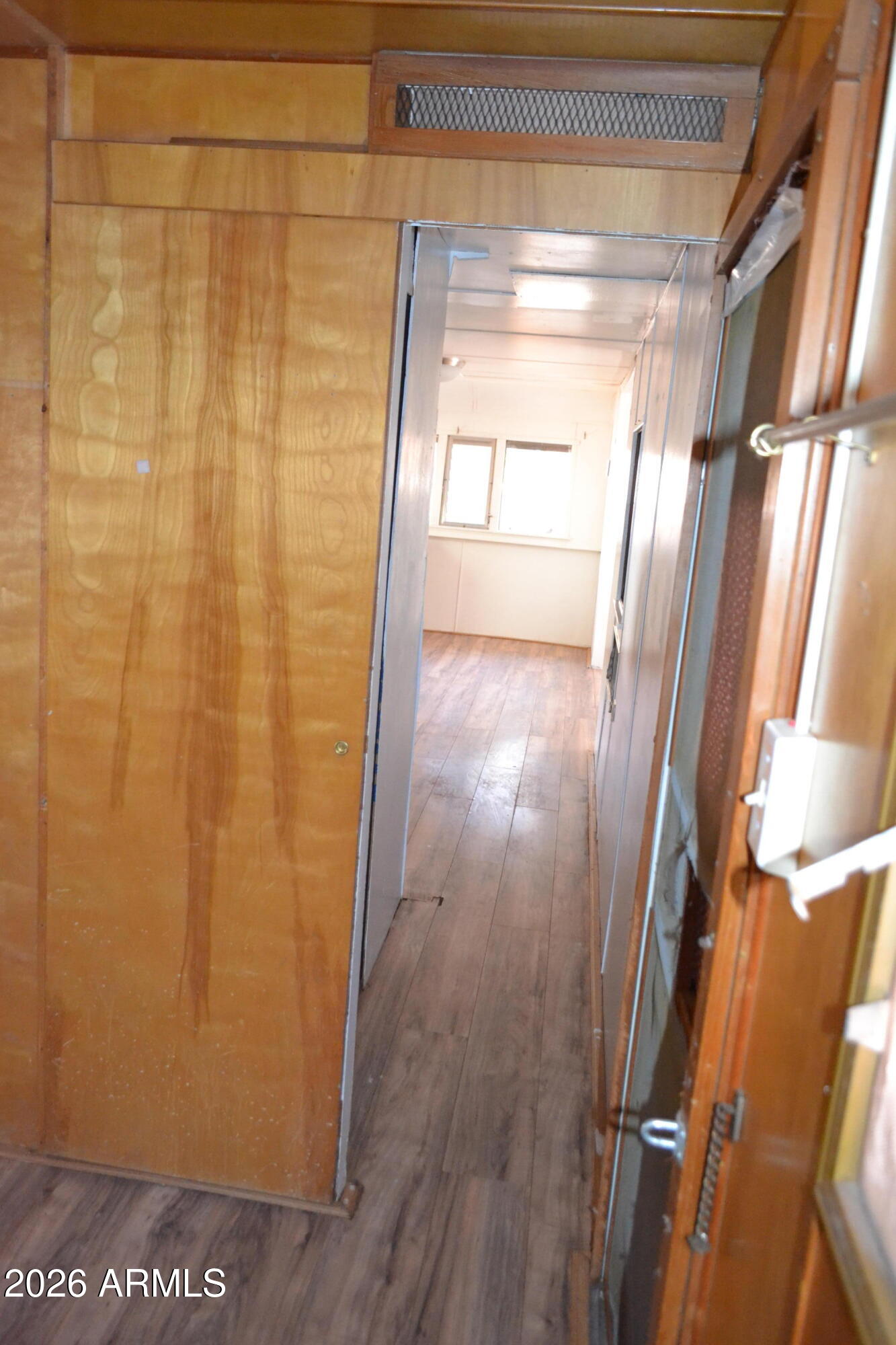 5994 D Street Lakeside, AZ 85929 - Photo 13 of 21 a view of empty room with wooden floor and fan