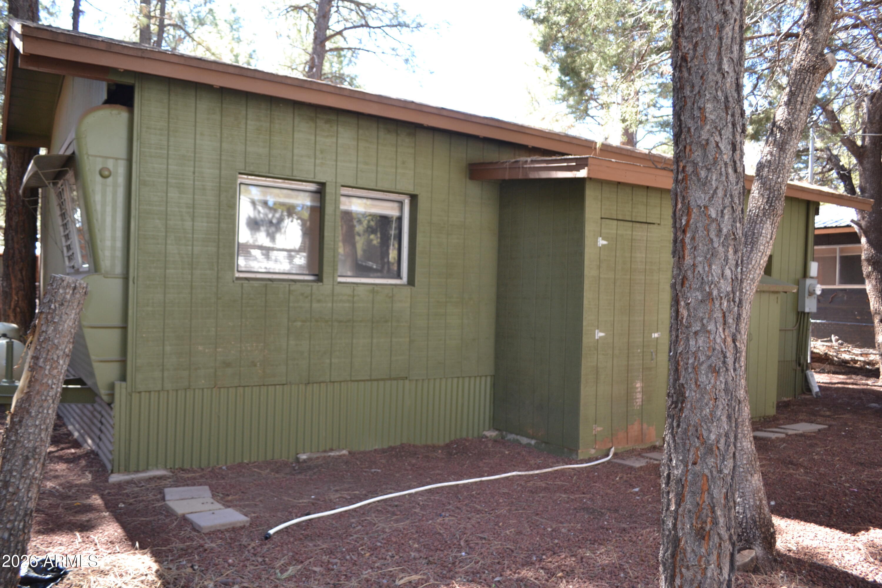 5994 D Street Lakeside, AZ 85929 - Photo 18 of 21 a backyard of a house
