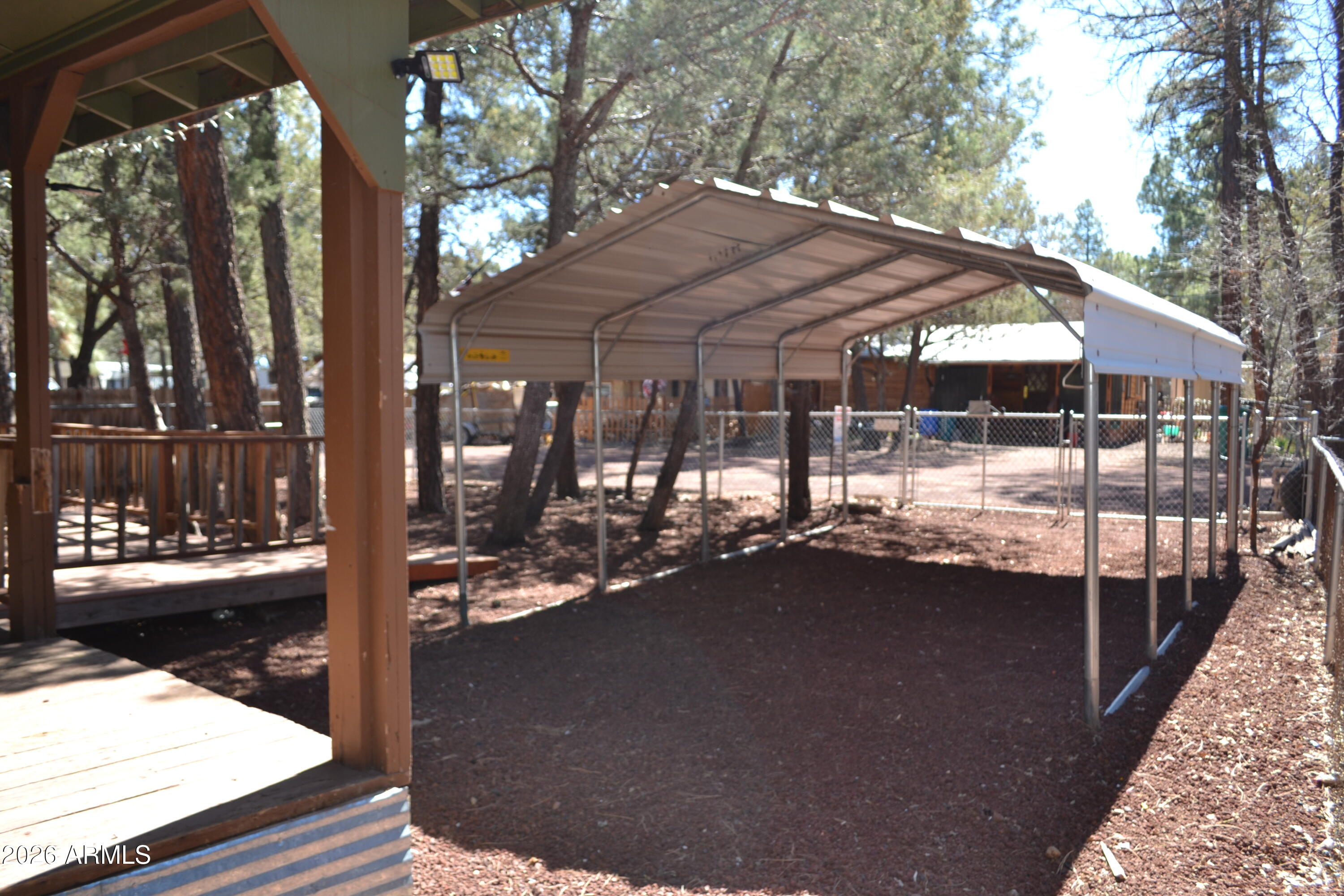 5994 D Street Lakeside, AZ 85929 - Photo 20 of 21 a view of a house with backyard and sitting area