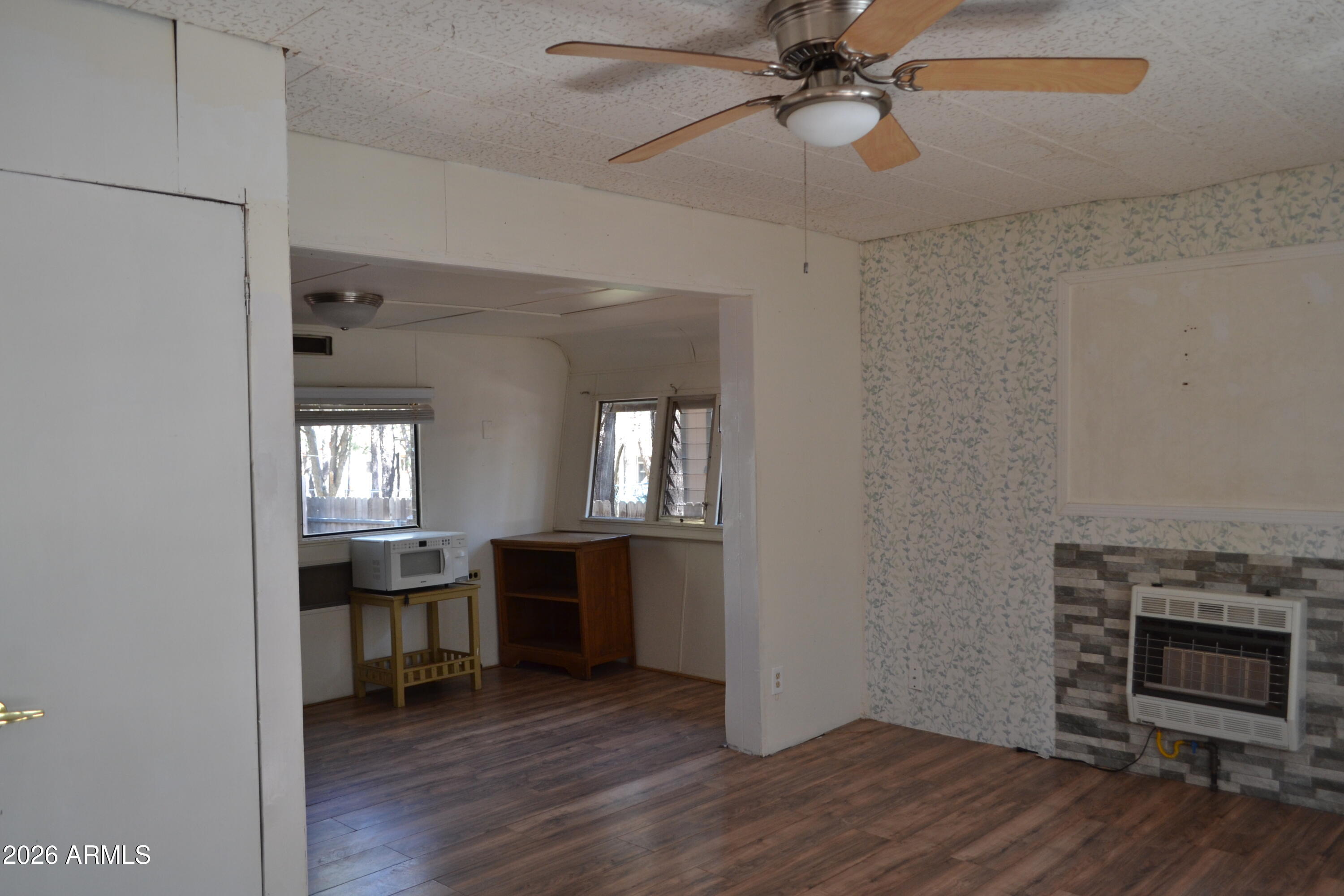 5994 D Street Lakeside, AZ 85929 - Photo 4 of 21 a view of kitchen and dining room with wooden floor