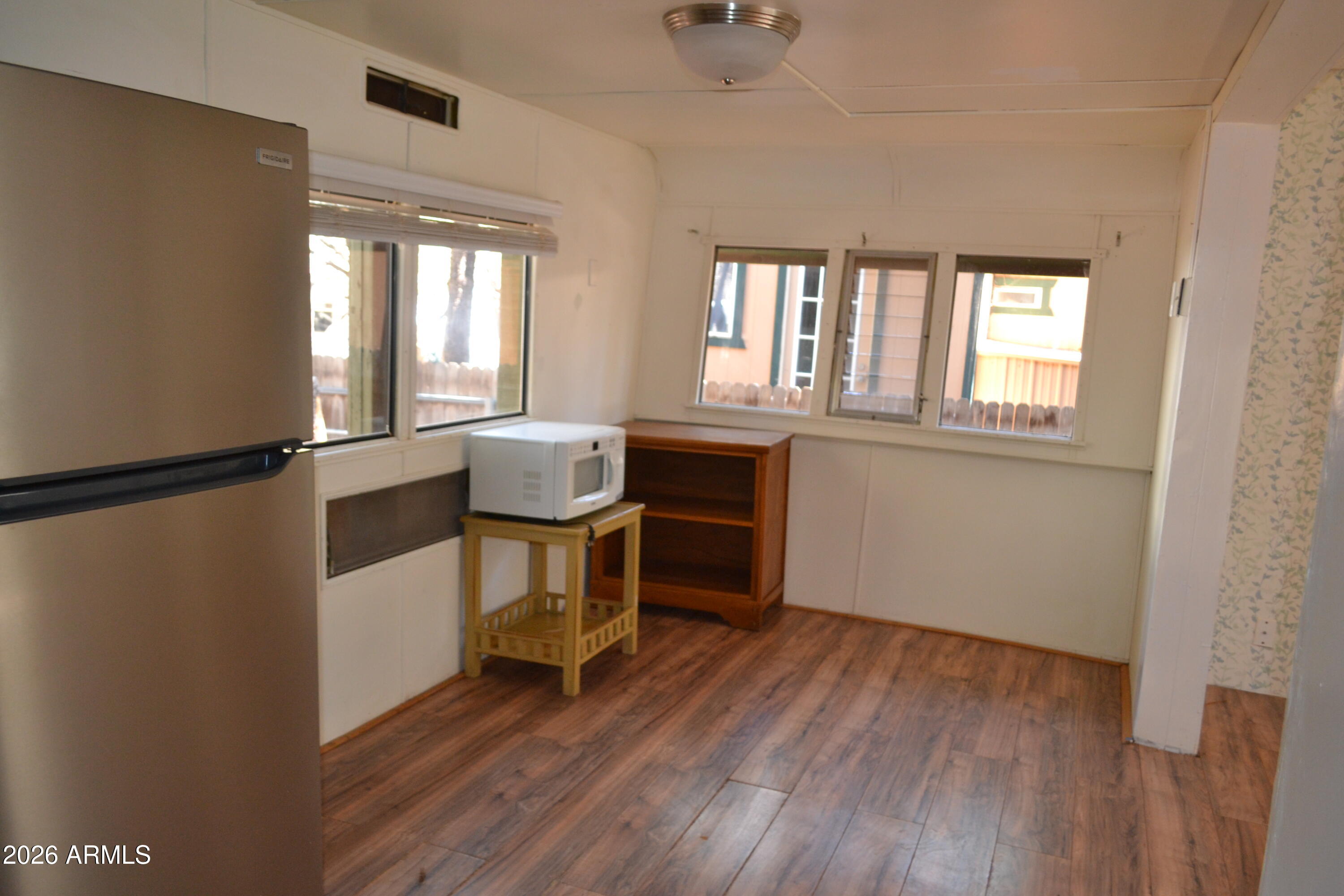 5994 D Street Lakeside, AZ 85929 - Photo 6 of 21 a workspace with wooden floor and furniture