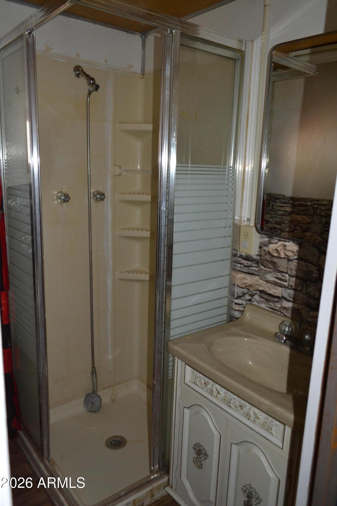 5994 D Street Lakeside, AZ 85929 - Photo 9 of 21 a bathroom with a shower and a sink