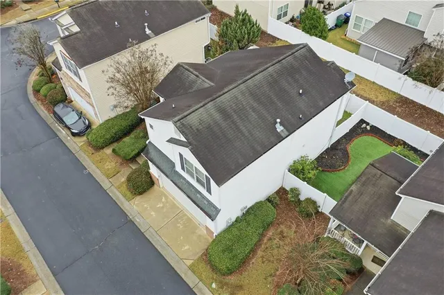 an aerial view of a house with a garden