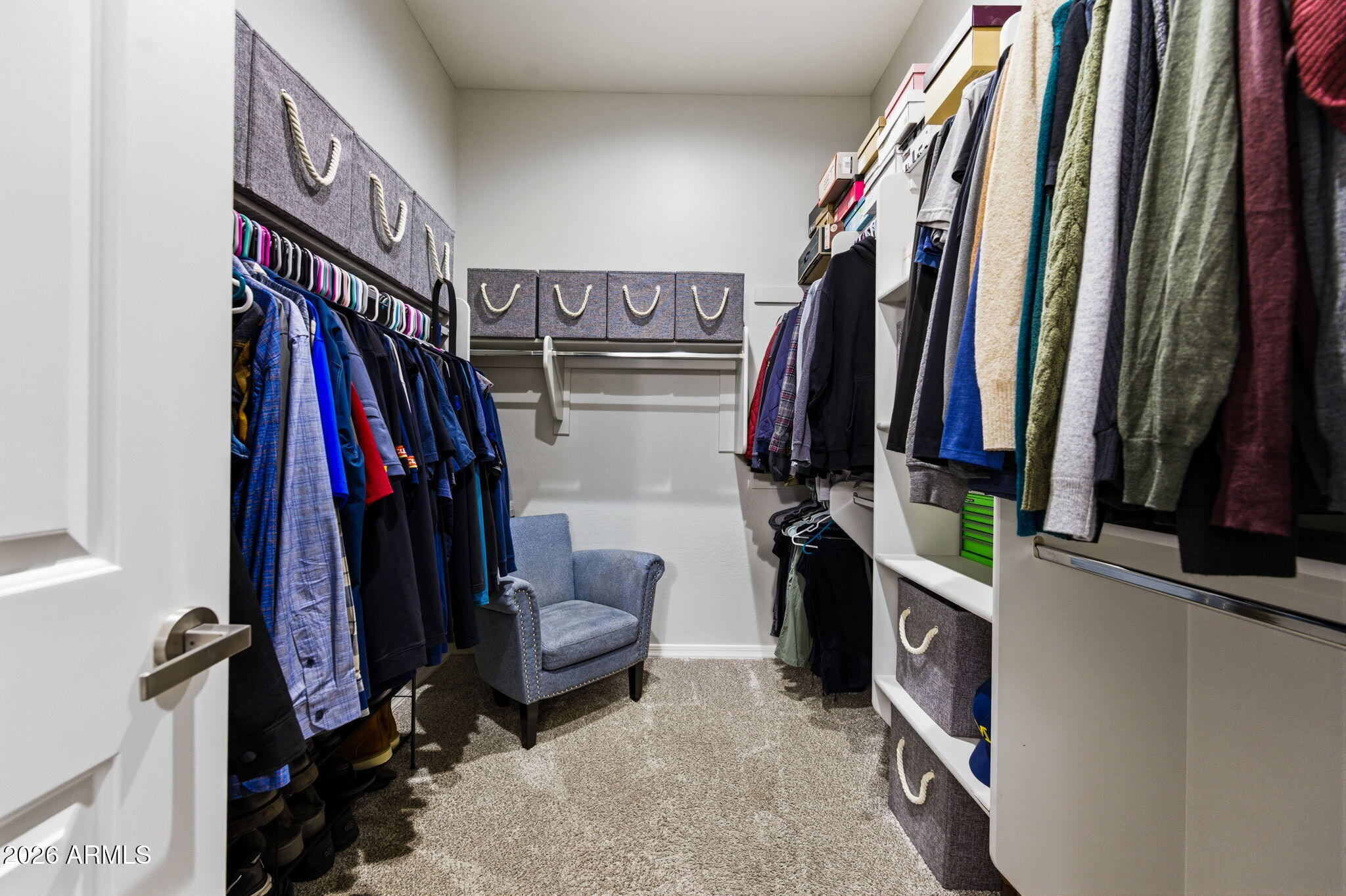 23066 East Mayberry Road Queen Creek, AZ 85142 - Photo 13 of 39 a view of walk in closet with clothes and shoes