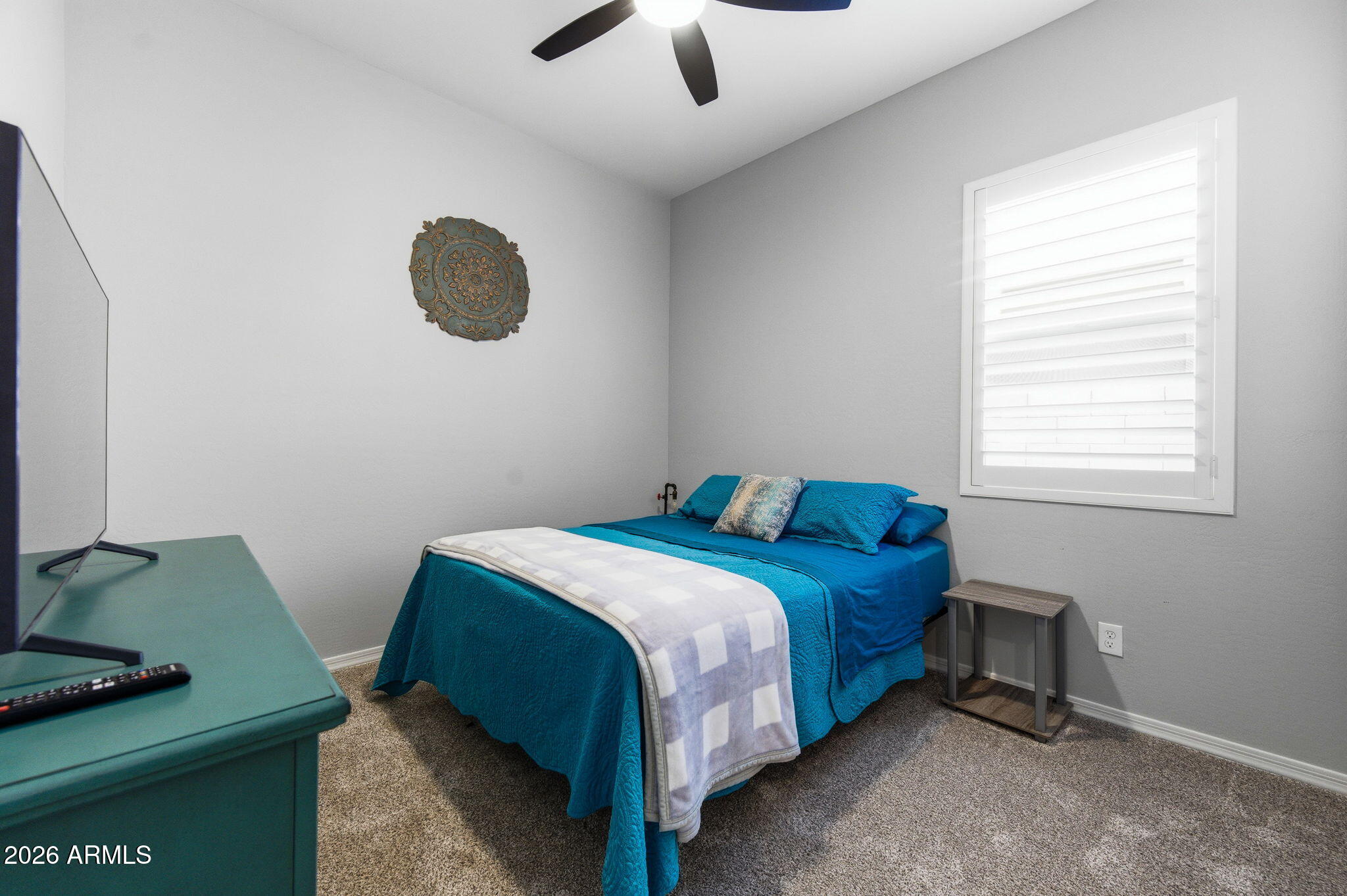 23066 East Mayberry Road Queen Creek, AZ 85142 - Photo 18 of 39 a bedroom with a bed and a window