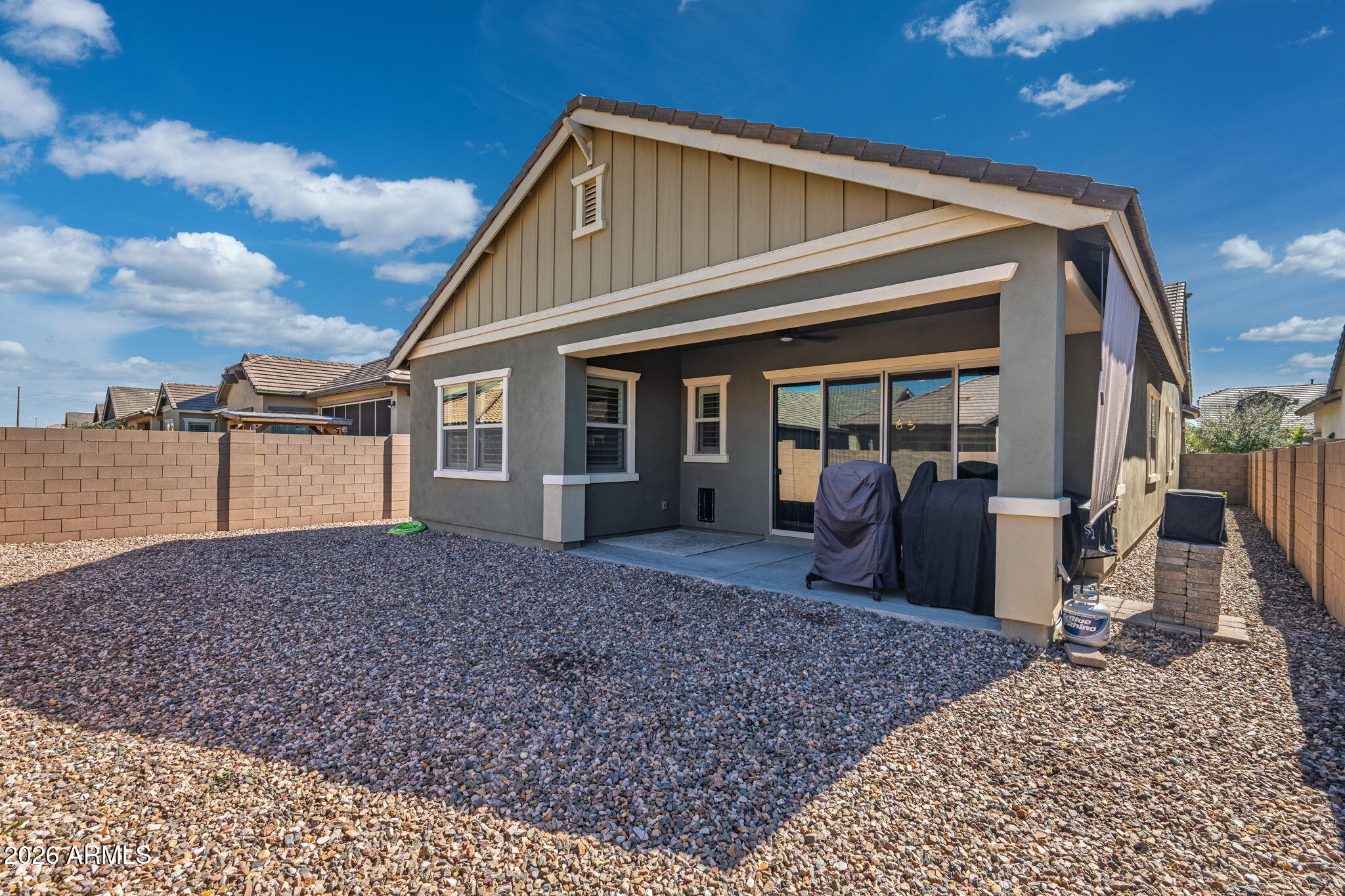 23066 East Mayberry Road Queen Creek, AZ 85142 - Photo 23 of 39 a view of a house with backyard porch and sitting area