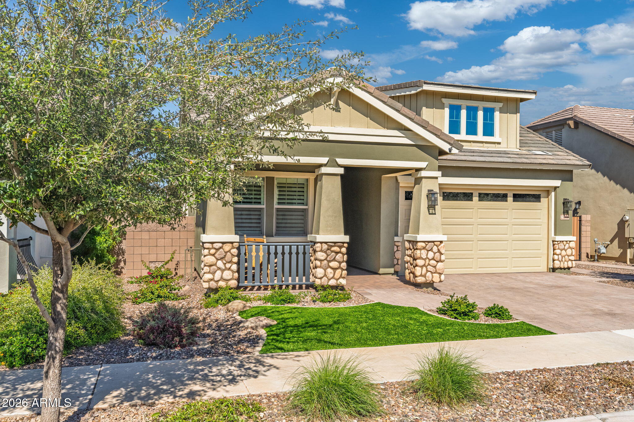 23066 East Mayberry Road Queen Creek, AZ 85142 - Photo 2 of 39 a front view of a house with garden