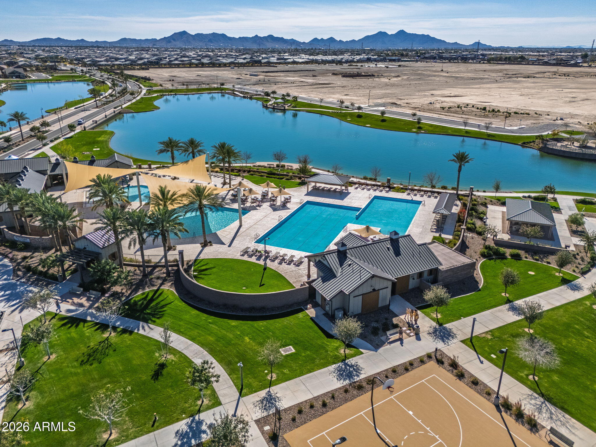 23066 East Mayberry Road Queen Creek, AZ 85142 - Photo 36 of 39 an aerial view of a house with outdoor space and lake view
