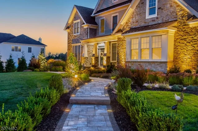 a house with garden in front of it