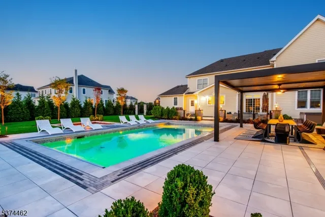 a view of a patio with swimming pool
