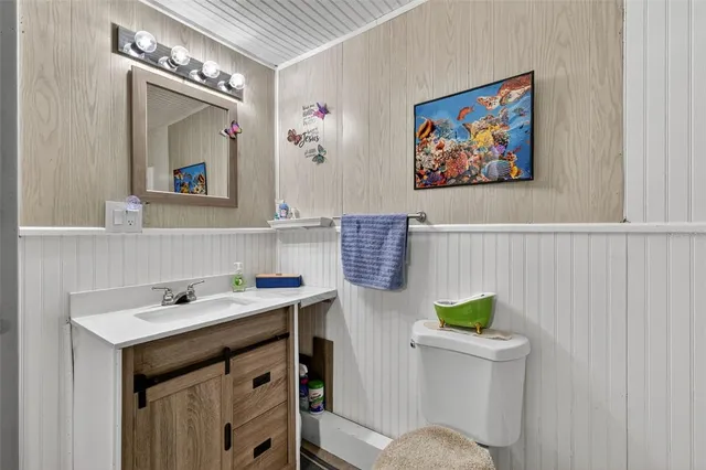 a bathroom with a shower and a toilet