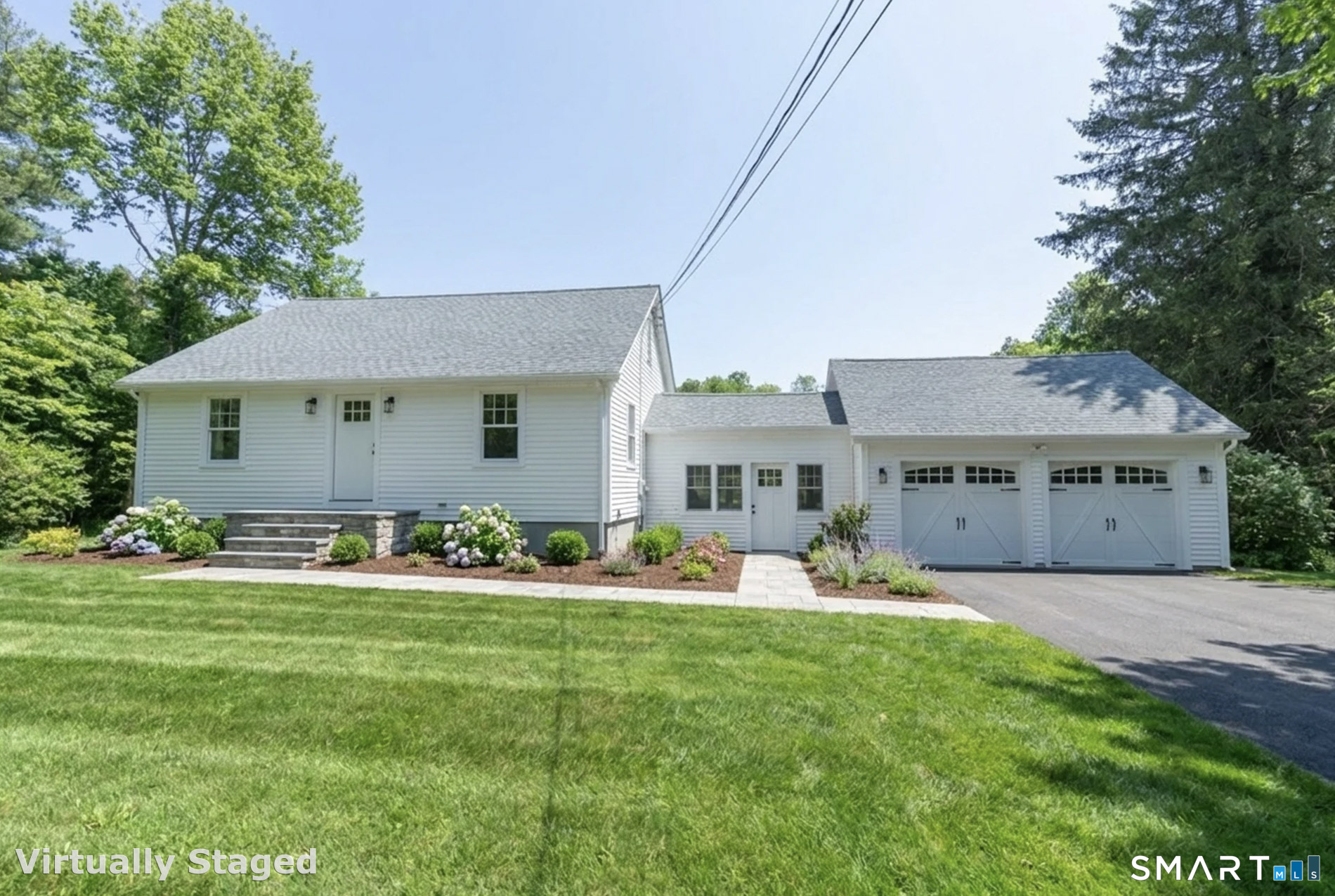 1973 Long Hill Road Guilford, CT 06437 - Photo 19 of 19 a front view of a house with a yard and trees