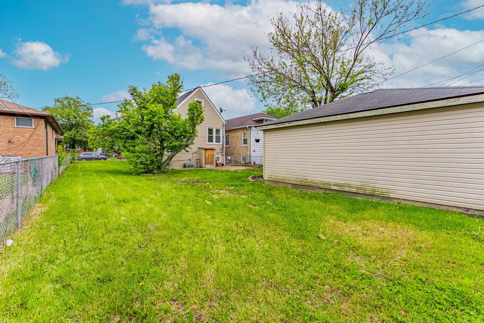 1330 Ridgeland Avenue Berwyn, IL 60402 - Photo 23 of 23 a view of a backyard with a garden