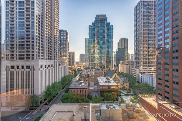 a view of a city with tall buildings