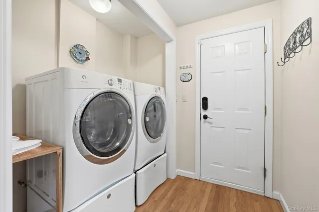 a view of a storage & utility room with washer and dryer