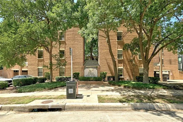 a view of a balcony with chairs