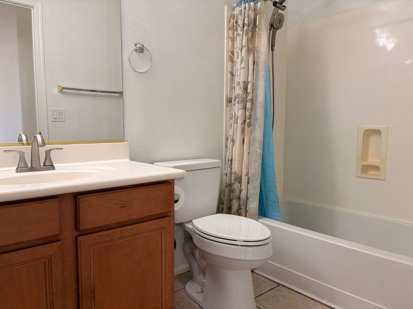 3872 East Simpson Road Gilbert, AZ 85297 - Photo 15 of 25 a bathroom with a sink a toilet and shower