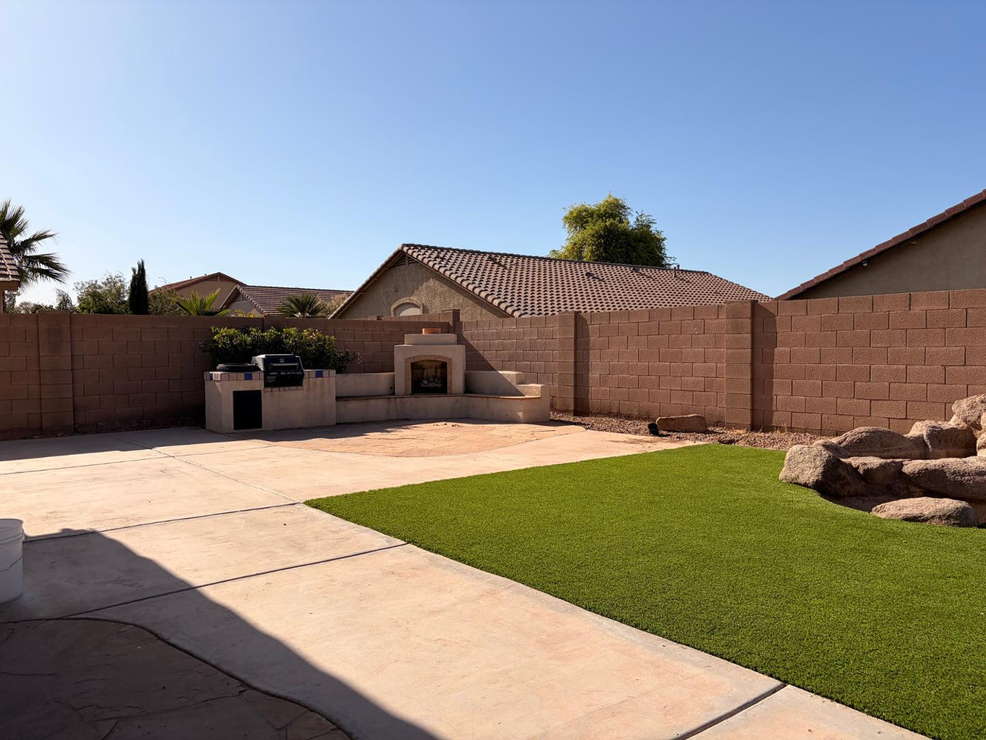 3872 East Simpson Road Gilbert, AZ 85297 - Photo 24 of 25 a front view of a house with a garden