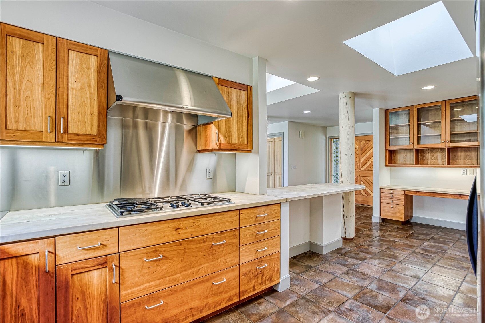 7580 Icicle Road Leavenworth, WA 98826 - Photo 13 of 38 a kitchen with stainless steel appliances granite countertop a sink and cabinets